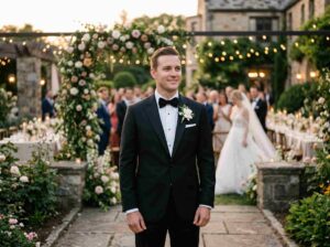 groom in classic black tuxedo